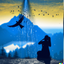 Image of the silhouette of a person and a bird with mountains in the background