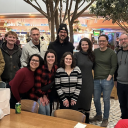 Photo of students and faculty in NYC posing with Kayla Rae Whitaker