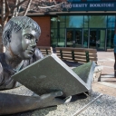 Pictured in fall 2019, an Appalachian State University student walks by an on-campus sculpture depicting a child mid-read. As part of App State’s virtual spring 2021 Hughlene Bostian Frank Visiting Writers Series, three novelists from the Appalachian region — Charles Dodd White, Annette Saunooke Clapsaddle and Carter Sickels — will read from their work and give talks on the craft of writing, and playwright Anna Deavere Smith will give a storytelling presentation. Photo by Marie Freeman