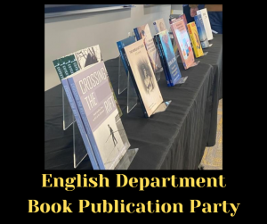 A collection of books displayed on a table with a black tablecloth